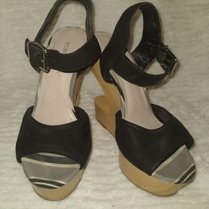 BCBGeneration cutout platform sandals.